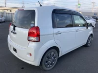 Toyota PORTE лот № 303 оценка 3.5  с аукциона в Японии 1