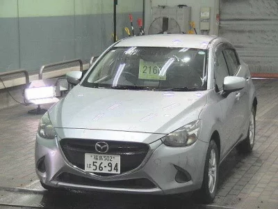 Mazda DEMIO  с аукциона в Японии