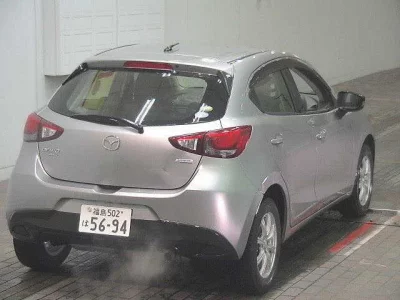 Mazda DEMIO  с аукциона в Японии