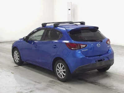 Mazda DEMIO  с аукциона в Японии