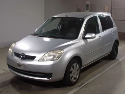 Mazda DEMIO  с аукциона в Японии