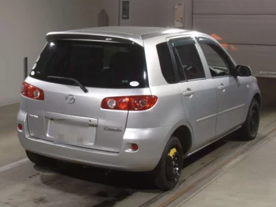Mazda DEMIO  с аукциона в Японии