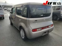 Nissan CUBE лот № 1077 оценка 4  с аукциона в Японии 1