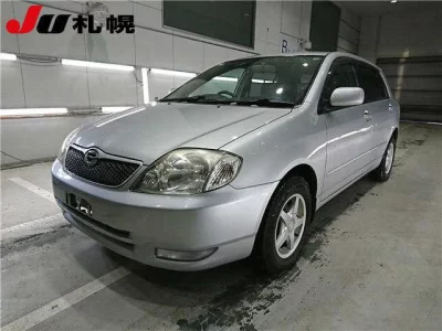 Toyota COROLLA RUNX  с аукциона в Японии