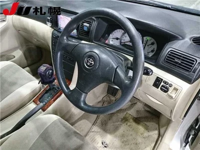 Toyota COROLLA RUNX  с аукциона в Японии