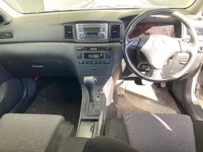 Toyota COROLLA RUNX  с аукциона в Японии