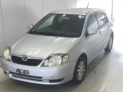 Toyota COROLLA RUNX  с аукциона в Японии