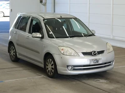 Mazda DEMIO  с аукциона в Японии