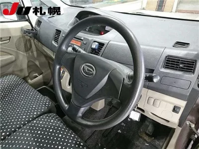 Daihatsu MOVE  с аукциона в Японии