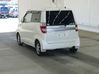 Honda ZEST лот № 2213 оценка RA  с аукциона в Японии 1