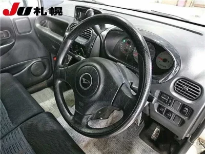 Daihatsu MOVE  с аукциона в Японии