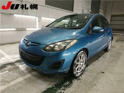 Mazda DEMIO  с аукциона в Японии