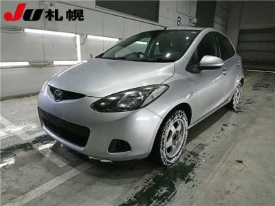 Mazda DEMIO  с аукциона в Японии