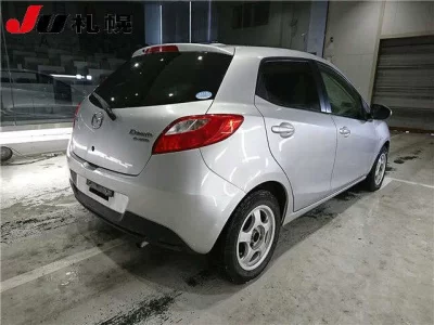 Mazda DEMIO  с аукциона в Японии