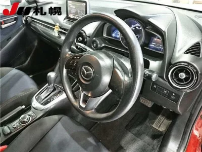 Mazda DEMIO  с аукциона в Японии