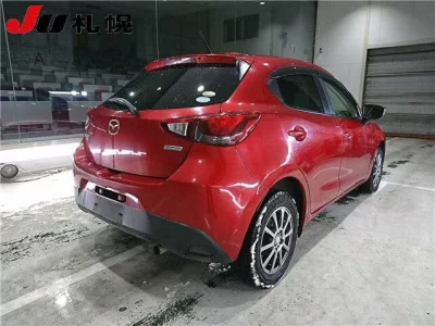 Mazda DEMIO  с аукциона в Японии