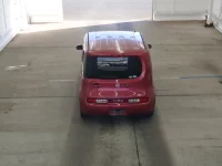 Nissan CUBE лот № 2293 оценка RA  с аукциона в Японии 2