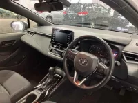 Toyota COROLLA SPORT лот № 70028 оценка 3.5  с аукциона в Японии 2