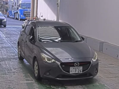 Mazda DEMIO  с аукциона в Японии