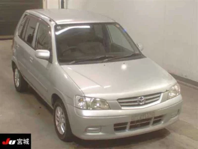 Mazda DEMIO  с аукциона в Японии
