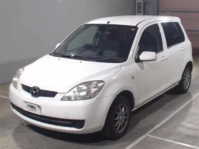 Mazda DEMIO  с аукциона в Японии