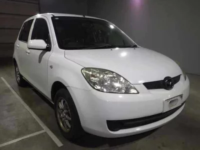 Mazda DEMIO  с аукциона в Японии