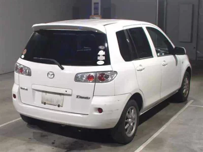 Mazda DEMIO  с аукциона в Японии