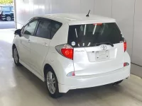 Toyota RACTIS лот № 3053 оценка R  с аукциона в Японии 1