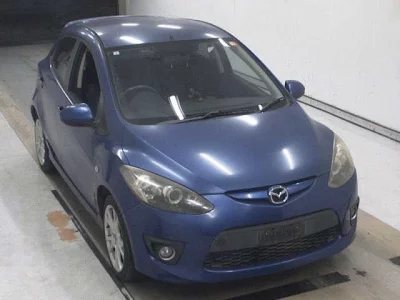 Mazda DEMIO  с аукциона в Японии