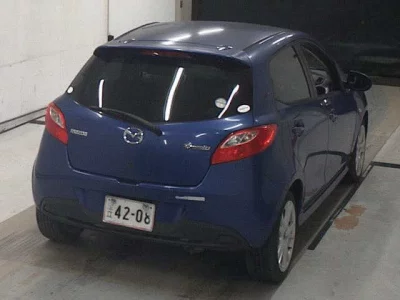 Mazda DEMIO  с аукциона в Японии