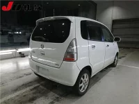 Nissan MOCO лот № 3551 оценка -  с аукциона в Японии 1