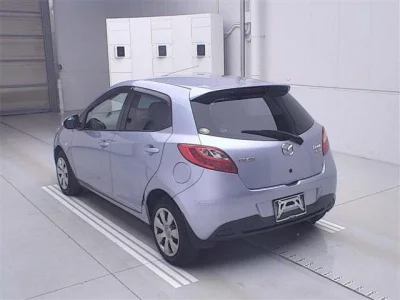 Mazda DEMIO  с аукциона в Японии