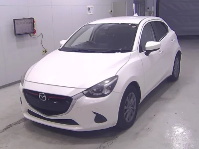 Mazda DEMIO  с аукциона в Японии