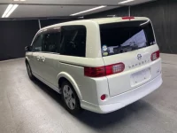 Nissan LAFESTA лот № 1010 оценка 3.5  с аукциона в Японии 1