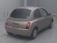 Nissan MARCH лот № 4055 оценка RA  с аукциона в Японии 1