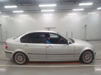 BMW 3-Series лот № 10574 оценка 3.5  с аукциона в Японии 2