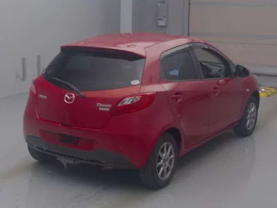 Mazda DEMIO  с аукциона в Японии