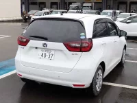 Honda FIT лот № 124 оценка 4  с аукциона в Японии 7