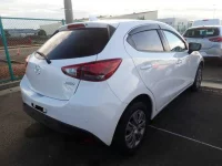 Mazda DEMIO лот № 57 оценка 4  с аукциона в Японии 1