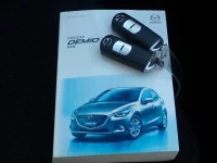 Mazda DEMIO лот № 57 оценка 4  с аукциона в Японии 9