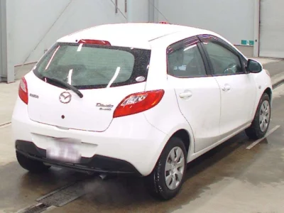 Mazda DEMIO  с аукциона в Японии