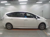 Toyota PRIUS ALPHA лот № 30911 оценка 3.5  с аукциона в Японии 2