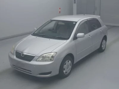 Toyota COROLLA RUNX  с аукциона в Японии