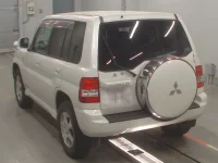 Mitsubishi PAJERO IO лот № 30923 оценка 4  с аукциона в Японии 5