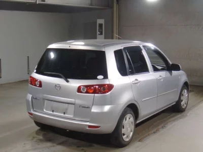 Mazda DEMIO  с аукциона в Японии