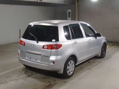 Mazda DEMIO  с аукциона в Японии