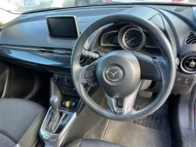 Mazda DEMIO  с аукциона в Японии