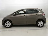 Toyota RACTIS лот № 36203 оценка 3  с аукциона в Японии 3