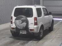 Suzuki JIMNY SIERRA лот № 748 оценка 3.5  с аукциона в Японии 1