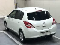 Nissan TIIDA лот № 1199 оценка 4  с аукциона в Японии 1